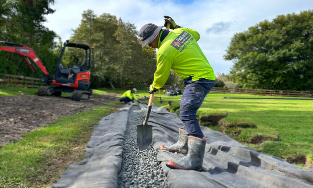 Holland Landscaping crew on a commercial landscape and drainage build in Auckland
