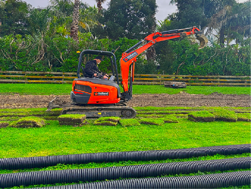 Bert, operating the excavator for drainage installation at an Auckland leisure venue