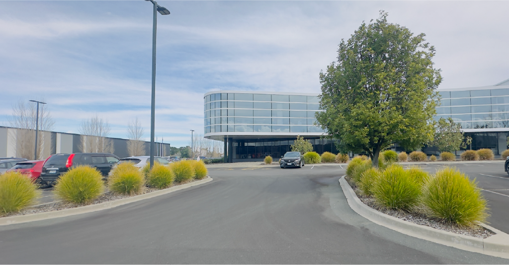 Holland Landscaping crew on grounds maintenance at an Auckland industrial facility