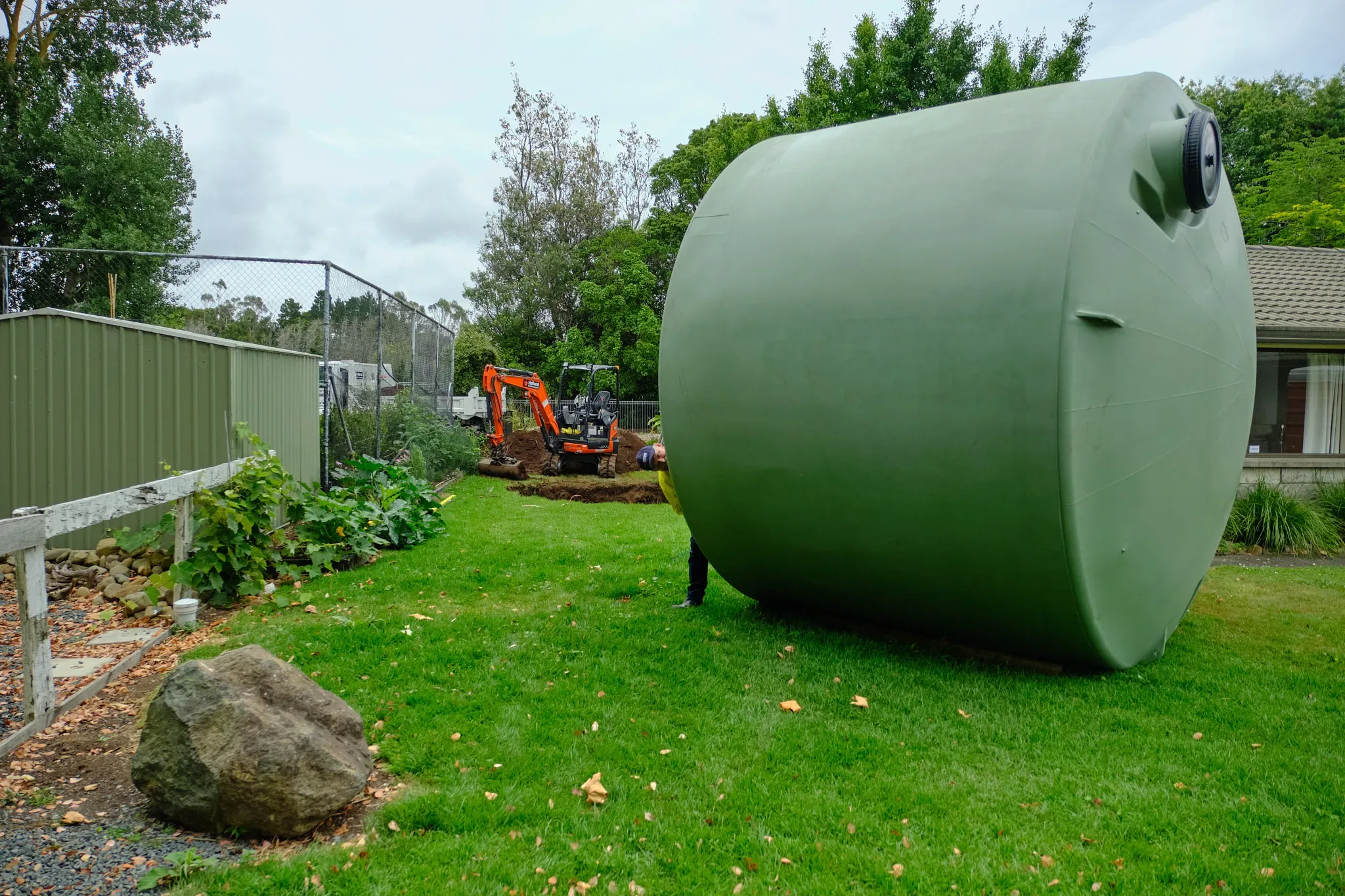 Water tank and drainage infrastructure installation on an Auckland site by Holland Landscaping