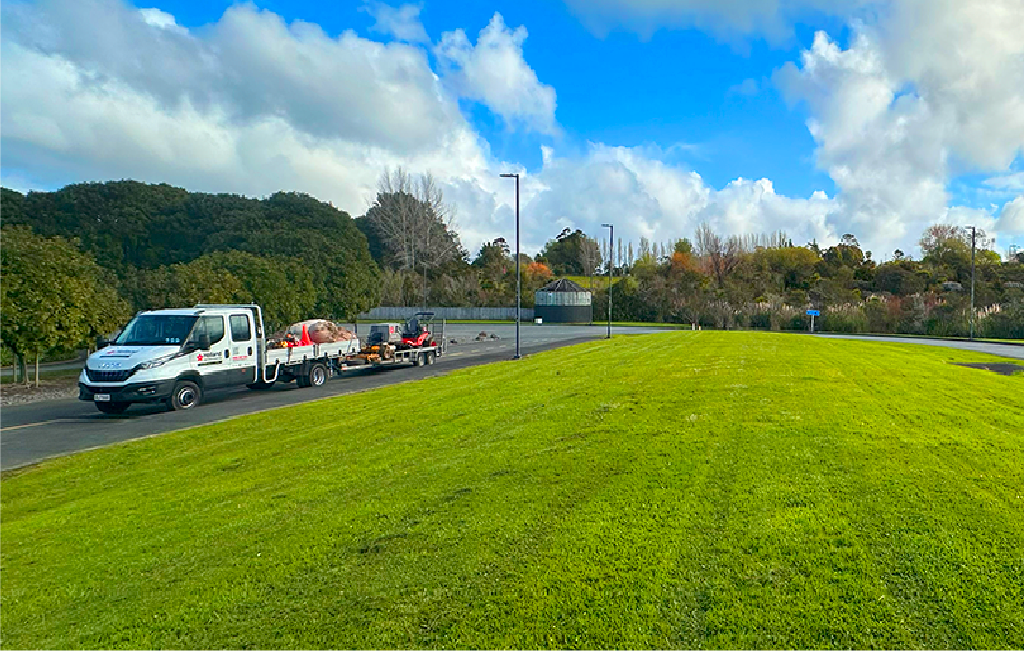 Holland landscaping fleet after mowing of the sports field on an Auckland school quad